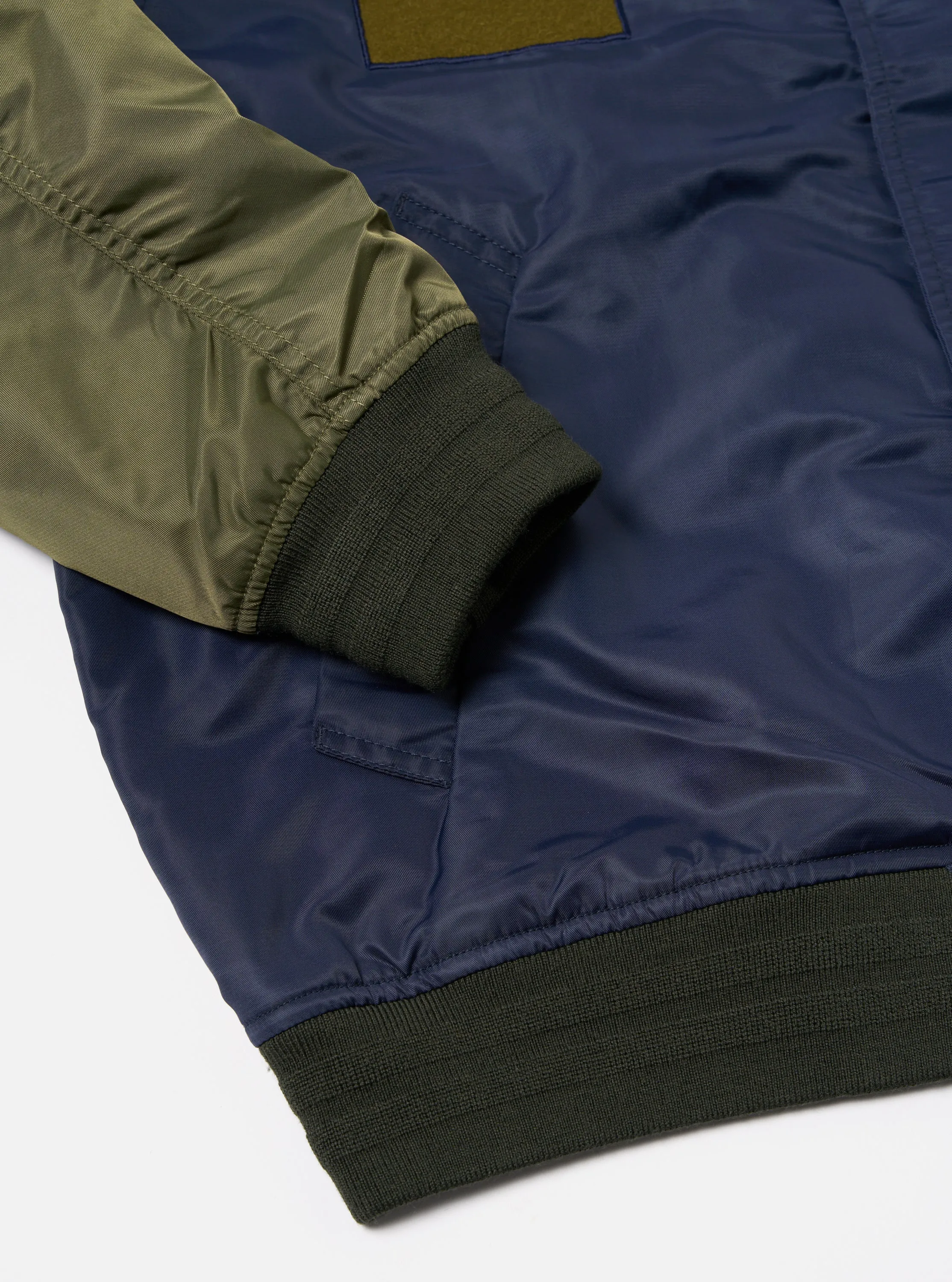 Universal Works Badge Bomber in Olive/Navy Flight Nylon